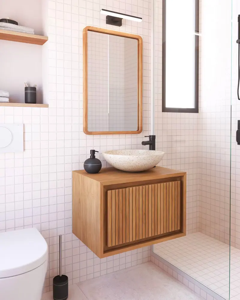 Floating slatted wood vanity with stone vessel sink, rounded wood mirror and white grid tiles