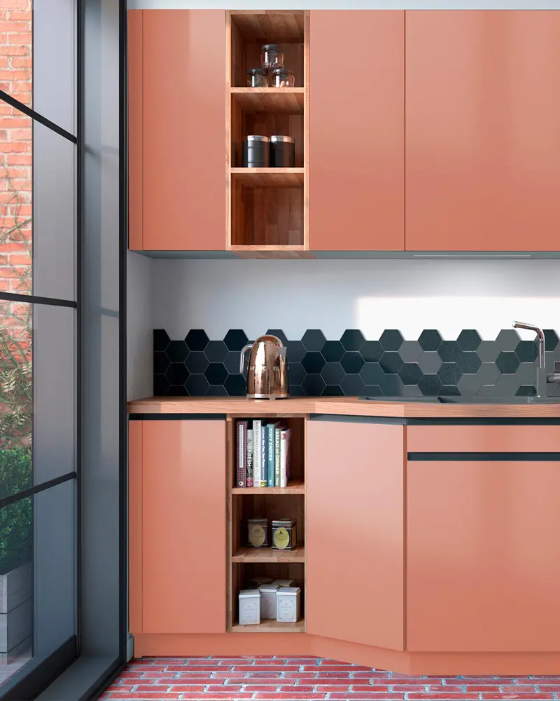 Terracotta kitchen cabinets with open wood niches and black hexagon backsplash